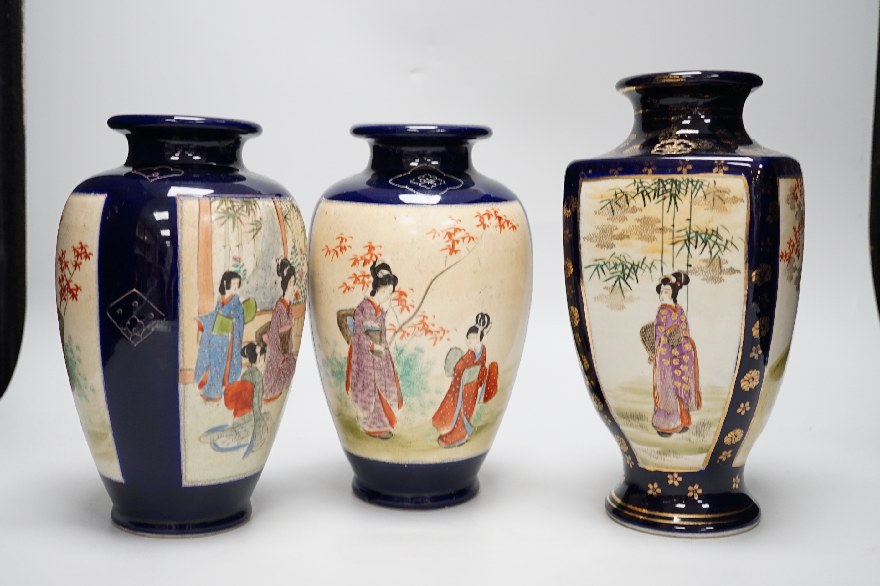 A Japanese Kakiemon bowl and three Satsuma pottery vases, tallest 24cm